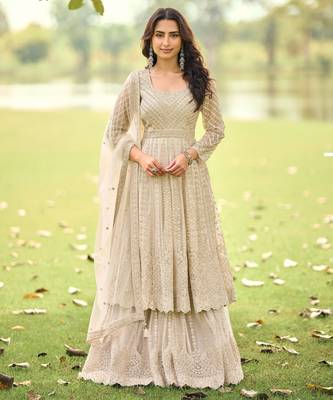 Beige embroidered net festive salwar suits 1