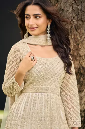 Beige embroidered net festive salwar suits