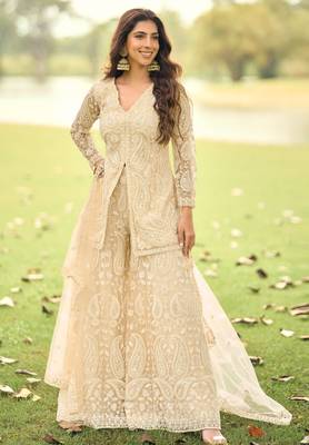 Beige embroidered net festive salwar suits 1