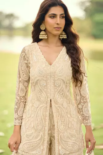 Beige embroidered net festive salwar suits