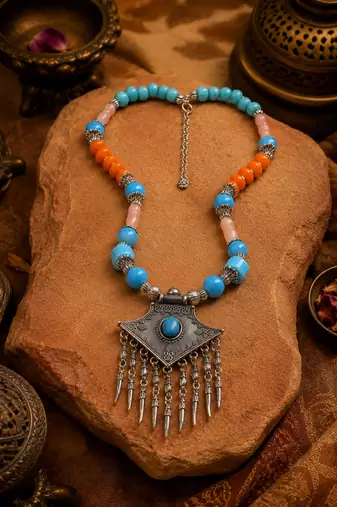 Handcrafted beaded necklace with german silver charm