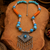 Handcrafted beaded necklace with german silver charm