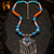Handcrafted beaded necklace with german silver charm