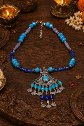 Traditional beaded necklace with ornamental pendant