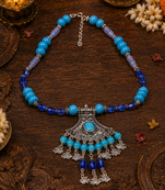 Traditional beaded necklace with ornamental pendant