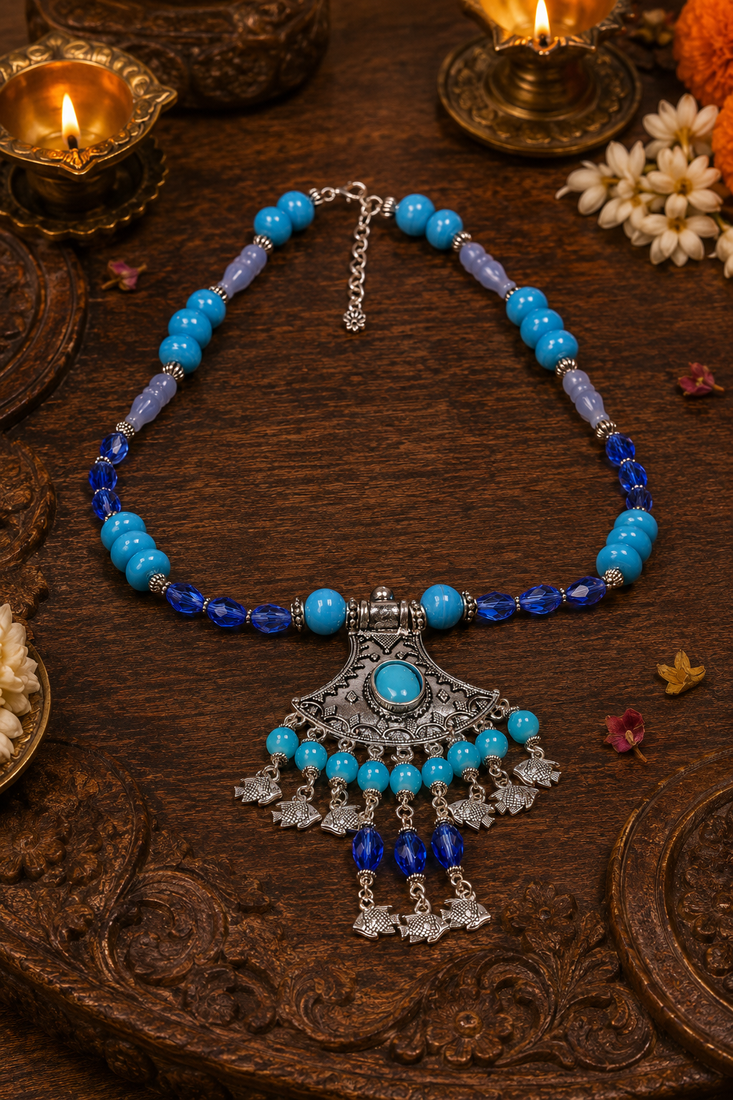 Traditional beaded necklace with ornamental pendant