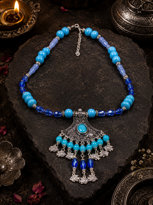 Traditional beaded necklace with ornamental pendant 2