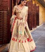 Glamorous Cream Zari Weaving Silk Marriage Wear Lehenga Choli