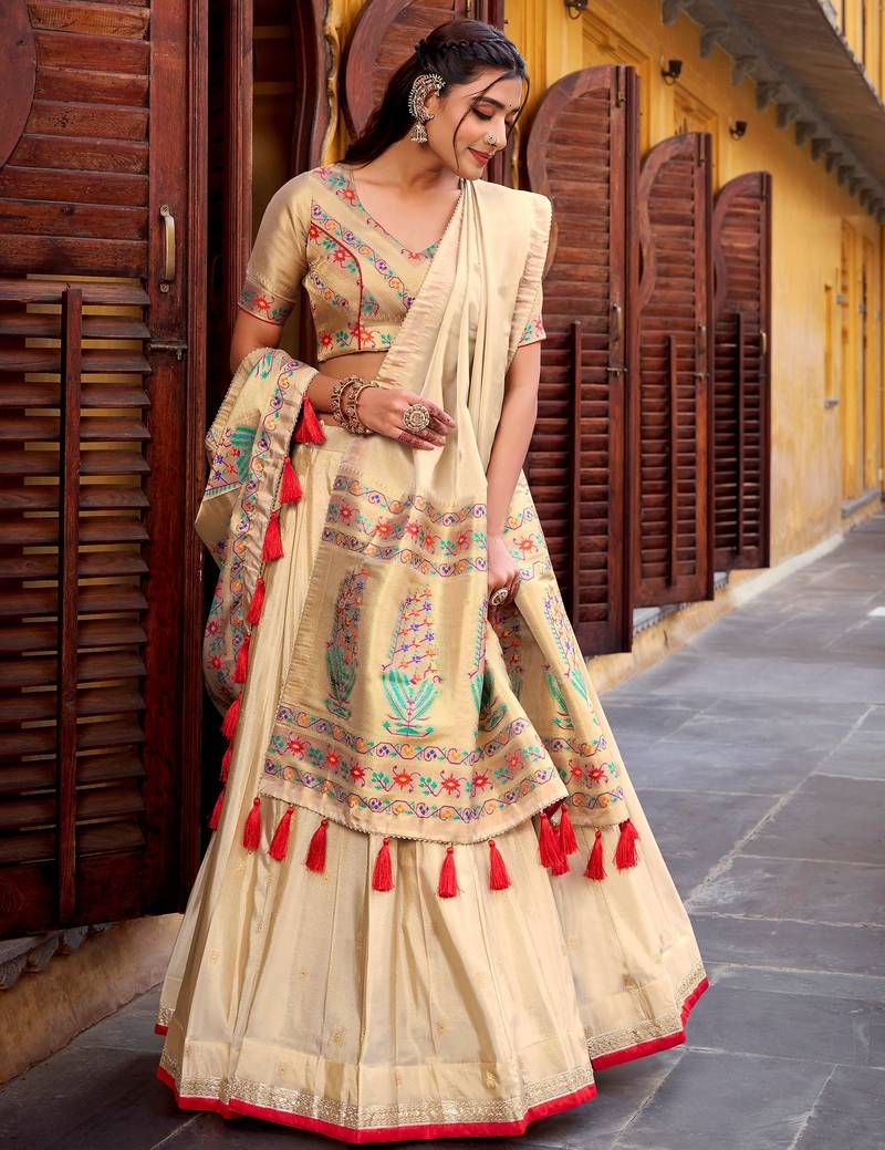 Glamorous Cream Zari Weaving Silk Marriage Wear Lehenga Choli
