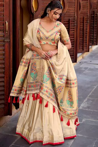 Glamorous Cream Zari Weaving Silk Marriage Wear Lehenga Choli