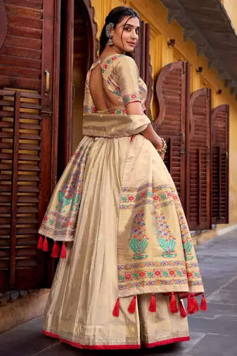 Glamorous Cream Zari Weaving Silk Marriage Wear Lehenga Choli