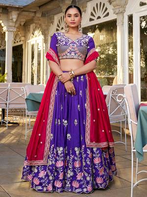 Elite Purple Embroidered Silk Wedding Wear Lehenga Choli With Dupatta 1