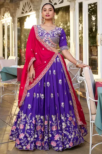 Elite Purple Embroidered Silk Wedding Wear Lehenga Choli With Dupatta