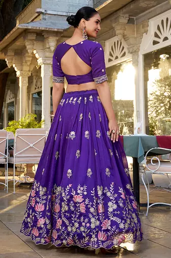 Elite Purple Embroidered Silk Wedding Wear Lehenga Choli With Dupatta