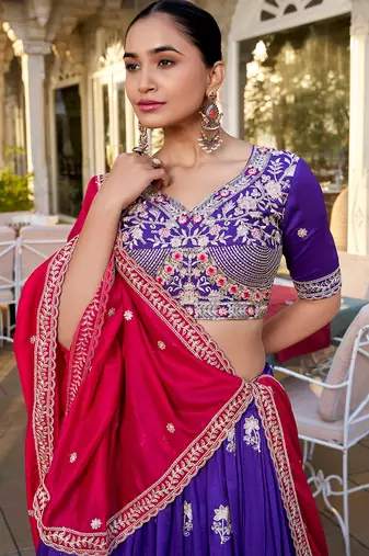 Elite Purple Embroidered Silk Wedding Wear Lehenga Choli With Dupatta