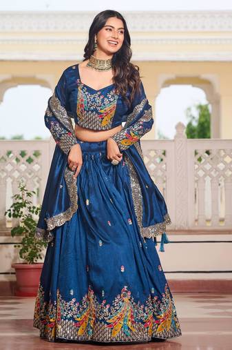 Blue Vichitra silk lehenga choli set featuring heavy peacock embroidery and sequins work