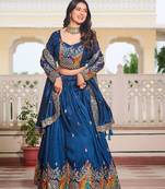 Blue Vichitra silk lehenga choli set featuring heavy peacock embroidery and sequins work