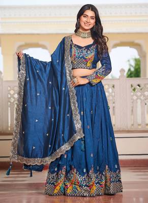 Blue Vichitra silk lehenga choli set featuring heavy peacock embroidery and sequins work-free size 2