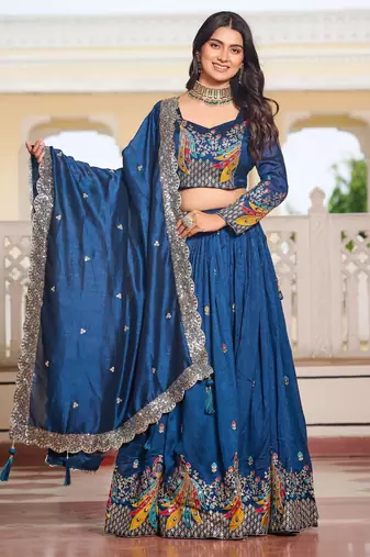 Blue Vichitra silk lehenga choli set featuring heavy peacock embroidery and sequins work