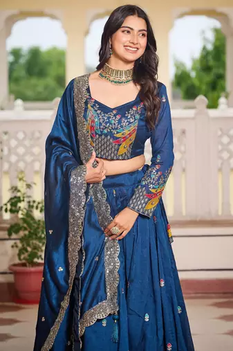 Blue Vichitra silk lehenga choli set featuring heavy peacock embroidery and sequins work