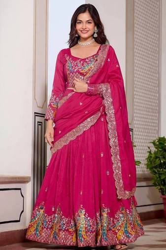 Rani Pink Vichitra silk lehenga choli set featuring heavy peacock embroidery and sequins work