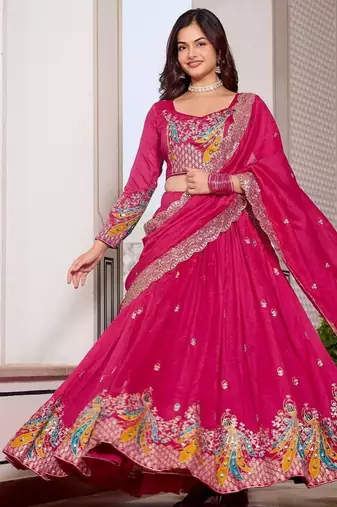 Rani Pink Vichitra silk lehenga choli set featuring heavy peacock embroidery and sequins work