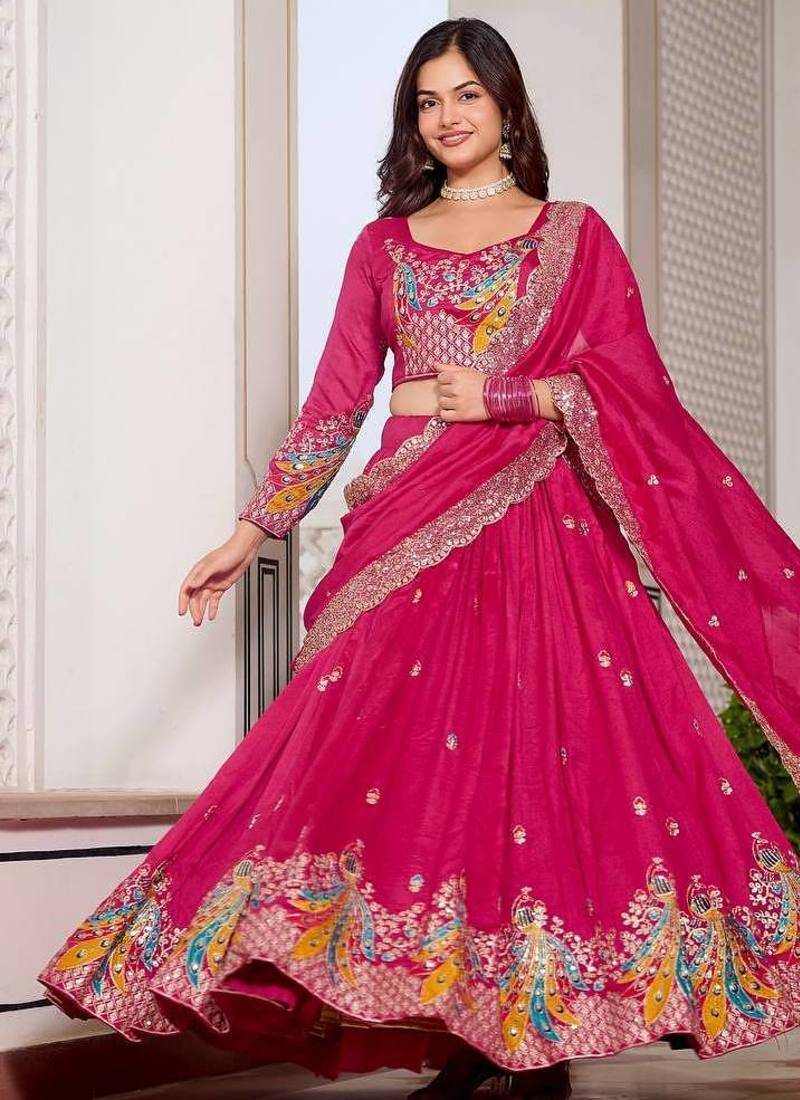 Rani Pink Vichitra silk lehenga choli set featuring heavy peacock embroidery and sequins work