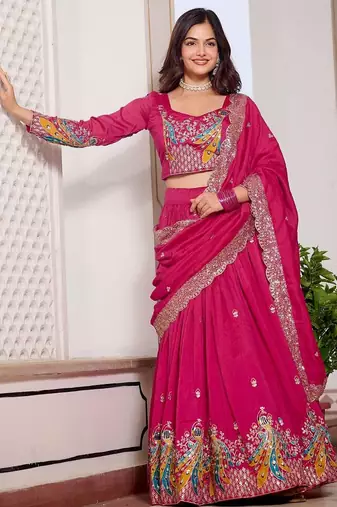 Rani Pink Vichitra silk lehenga choli set featuring heavy peacock embroidery and sequins work