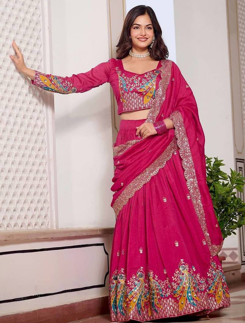 Rani Pink Vichitra silk lehenga choli set featuring heavy peacock embroidery and sequins work