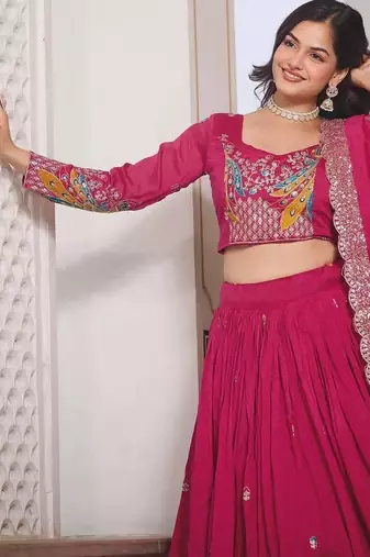 Rani Pink Vichitra silk lehenga choli set featuring heavy peacock embroidery and sequins work