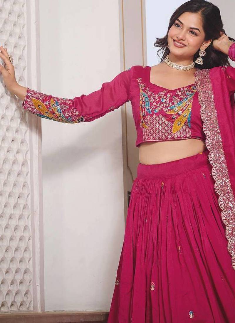 Rani Pink Vichitra silk lehenga choli set featuring heavy peacock embroidery and sequins work