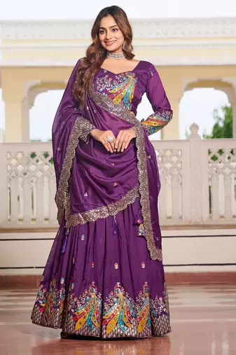 Purple Vichitra silk lehenga choli set featuring heavy peacock embroidery and sequins work