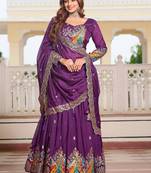 Purple Vichitra silk lehenga choli set featuring heavy peacock embroidery and sequins work