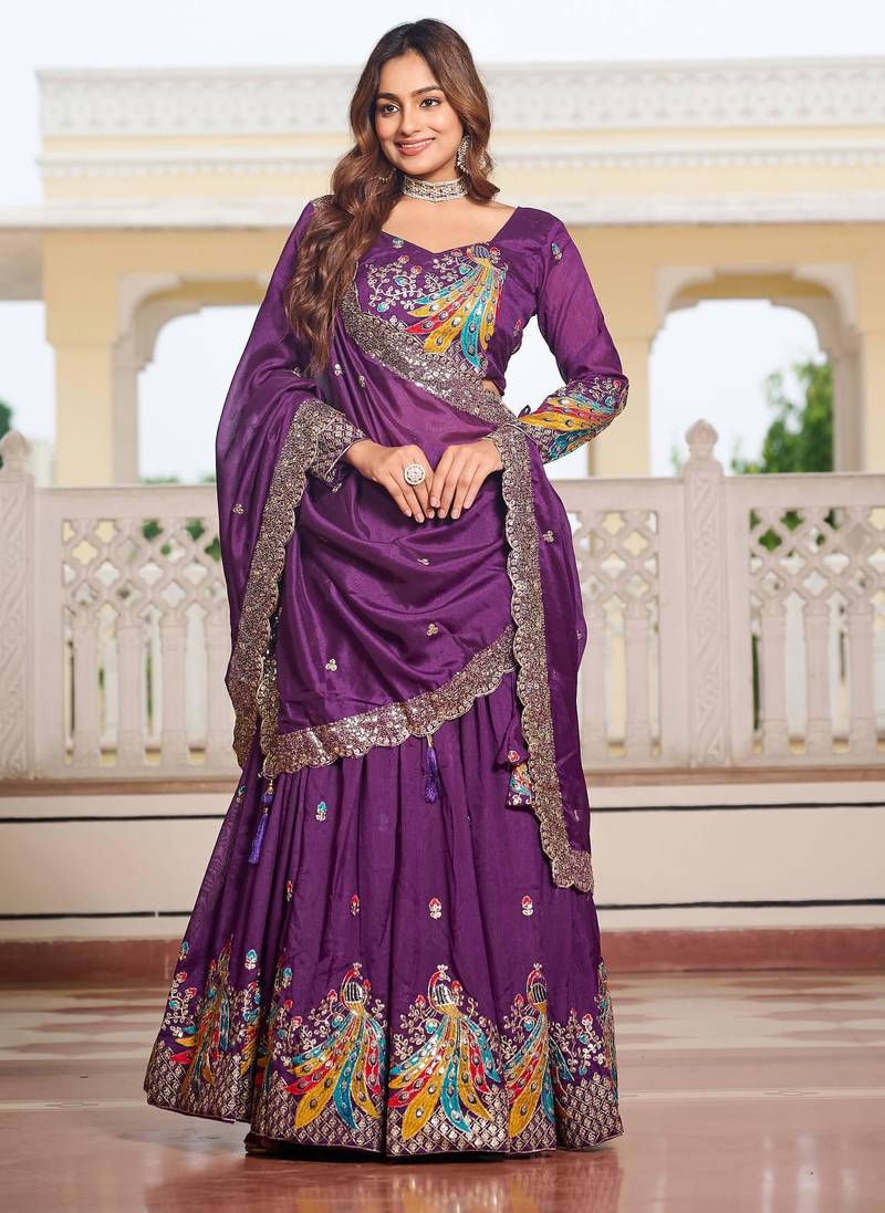 Purple Vichitra silk lehenga choli set featuring heavy peacock embroidery and sequins work