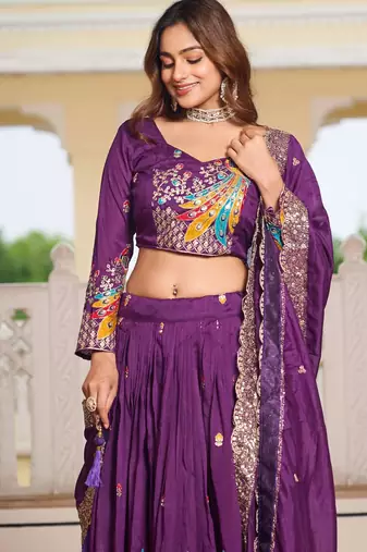 Purple Vichitra silk lehenga choli set featuring heavy peacock embroidery and sequins work