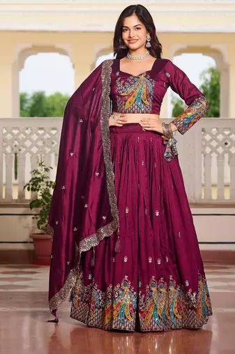 Magenta Vichitra silk lehenga choli set featuring heavy peacock embroidery and sequins work