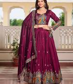 Magenta Vichitra silk lehenga choli set featuring heavy peacock embroidery and sequins work