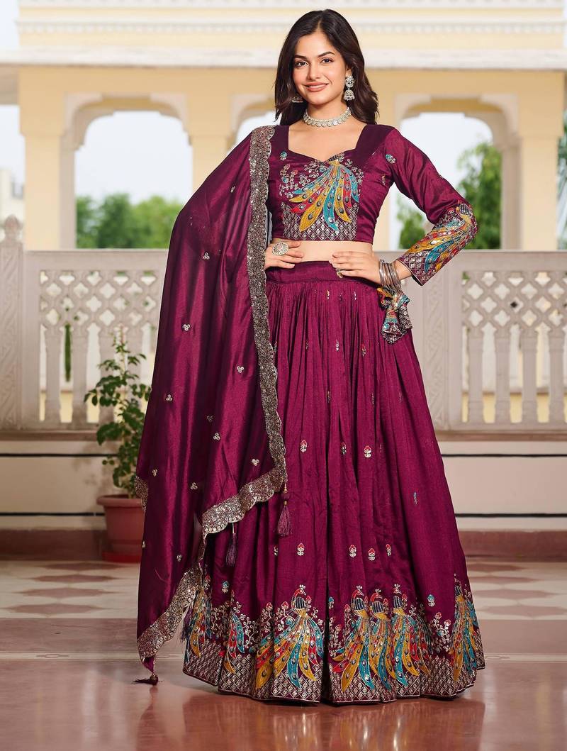 Magenta Vichitra silk lehenga choli set featuring heavy peacock embroidery and sequins work