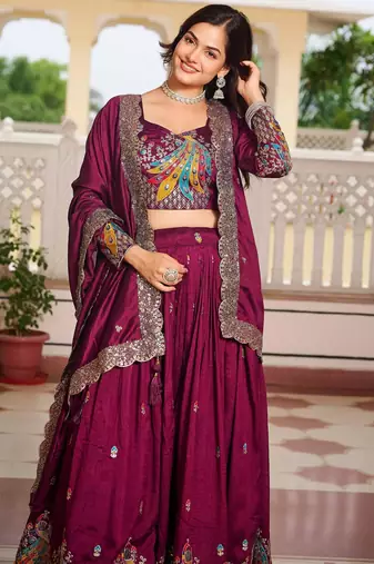 Magenta Vichitra silk lehenga choli set featuring heavy peacock embroidery and sequins work