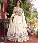 Off White Pure Vichitra silk lehenga choli featuring heavy embroidered paisley motifs, sequence work