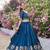 Blue Vichitra silk lehenga choli set featuring intricate elephant motif embroidery and sequin work