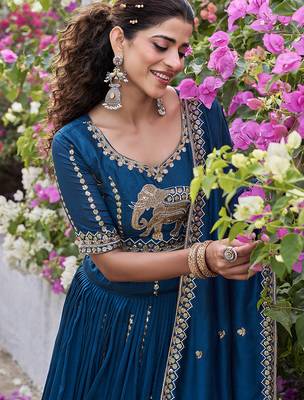 Blue Vichitra silk lehenga choli set featuring intricate elephant motif embroidery and sequin work 3