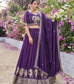 Wine Vichitra silk lehenga choli set featuring intricate elephant motif embroidery and sequin work