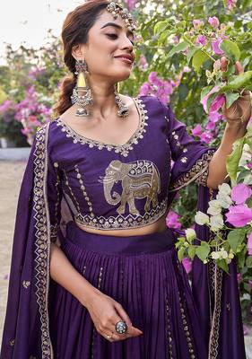 Wine Vichitra silk lehenga choli set featuring intricate elephant motif embroidery and sequin work 4