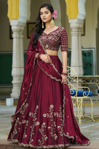 Magenta Vichitra silk lehenga choli set featuring intricate sequins and thread embroidery