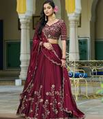 Magenta Vichitra silk lehenga choli set featuring intricate sequins and thread embroidery
