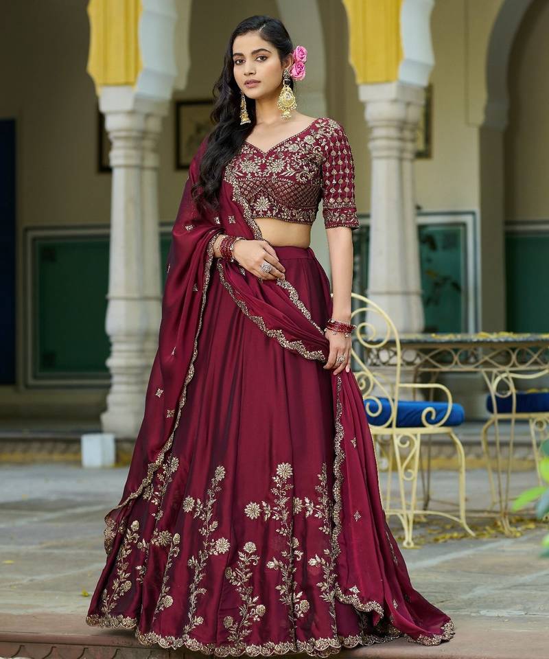 Magenta Vichitra silk lehenga choli set featuring intricate sequins and thread embroidery