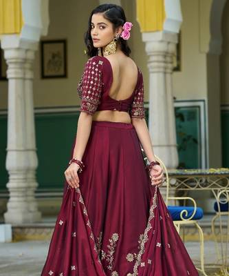 Magenta Vichitra silk lehenga choli set featuring intricate sequins and thread embroidery 2