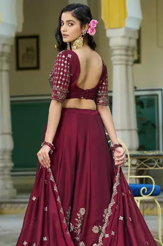 Magenta Vichitra silk lehenga choli set featuring intricate sequins and thread embroidery