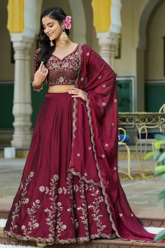 Magenta Vichitra silk lehenga choli set featuring intricate sequins and thread embroidery